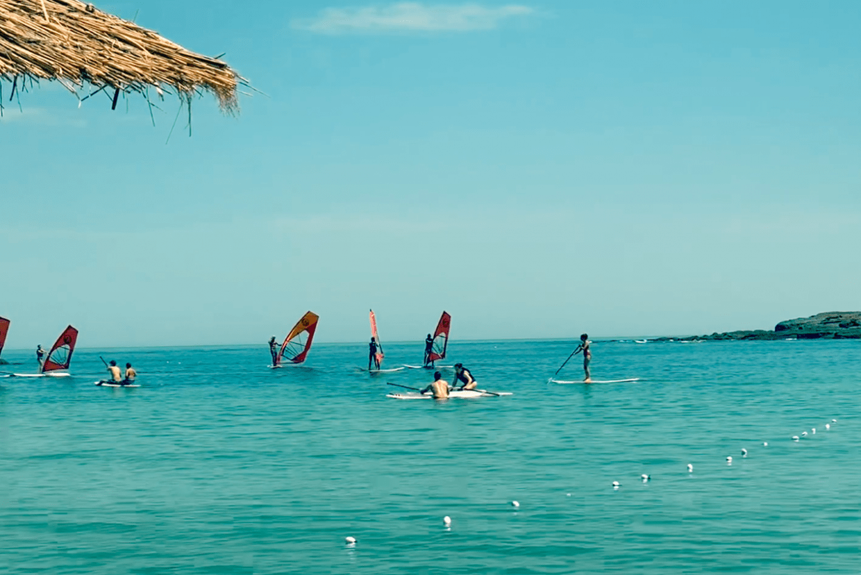 Despark crew catching the wind at the Black Sea 2019 Despark—Windsurfing team building on the Black Sea
